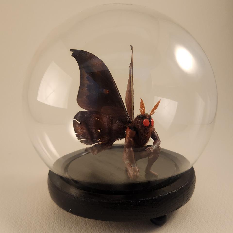Amos The Mothman In An Orb